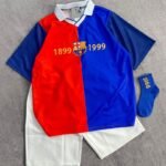 طقم رياضي مميز بتصميم جريء وألوان جذابة مستوحاة من ألوان نادي برشلونة